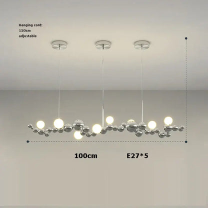 Modern chrome-finished pendant light with five spherical bulbs in a decorbites dimmable led hanging design