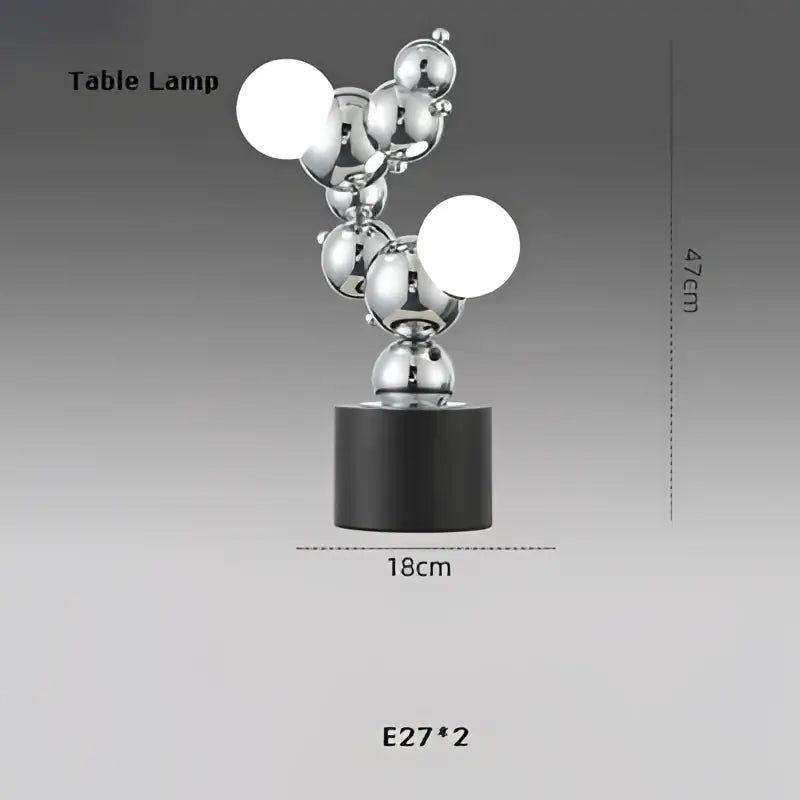 Silver metallic table lamp with modern abstract design and black base for decorbites dimmable led pendant light use