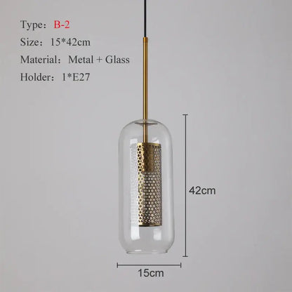 Modern gold and silver honeycomb glass pendant light with clear cylinder and brass rod as a kitchen pendant light