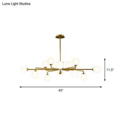 Gold-toned modern sputnik pendant lighting with white glass shades designed for living room with multiple globe bulbs