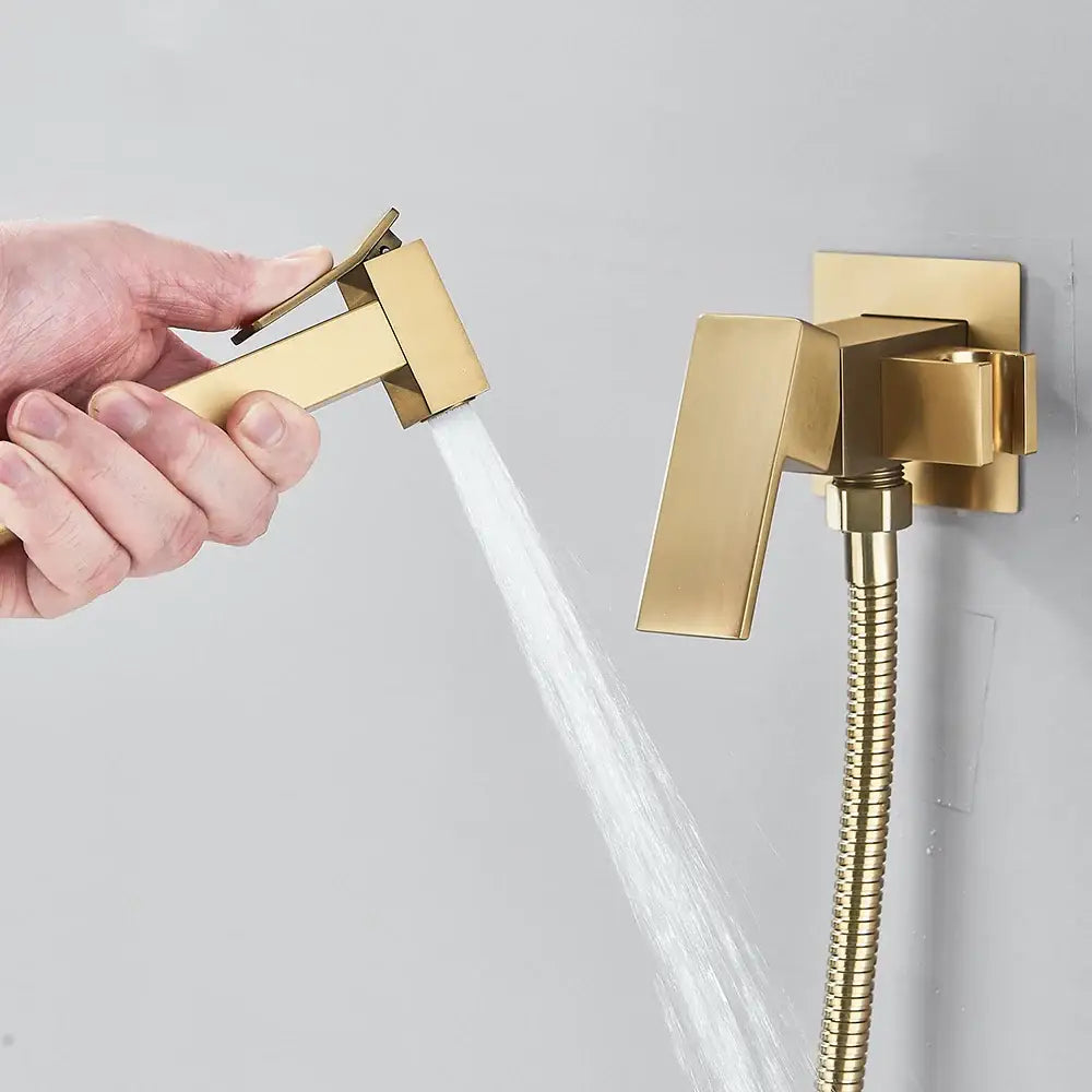 Modern gold square bidet shower faucet with handheld showerhead and flexible hose for wall-mounted bathroom use