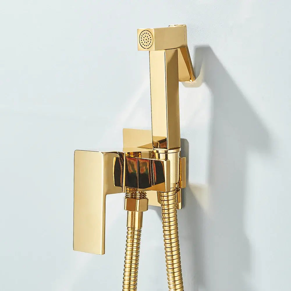 Modern gold square bidet shower faucet with a sleek rectangular handle and flexible hose for wall-mounted use