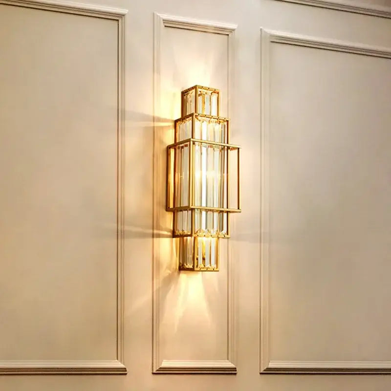 Modern gold wall lamp with stacked rectangular glass crystal panels for luxury bedroom lighting