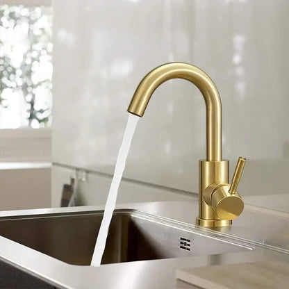 Modern gold stainless steel basin faucet with sleek curved spout and cylindrical handle for bathroom sinks decorbites gold stainless