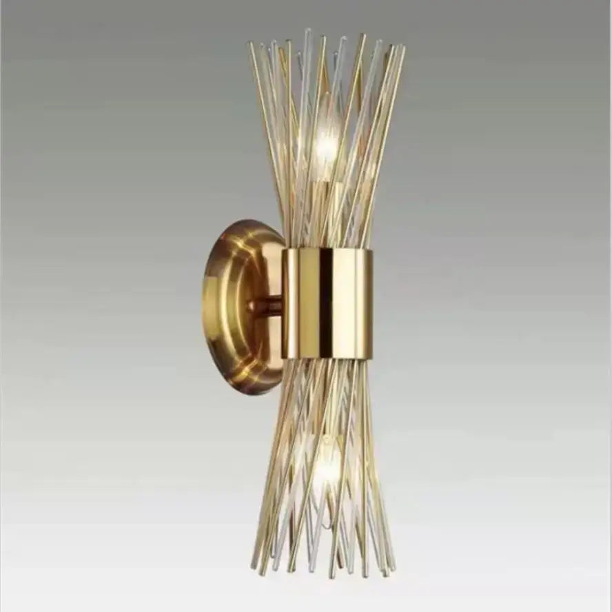 Modern gold stainless steel wall sconce with radial fluted glass rods by decorbites for bedroom decor
