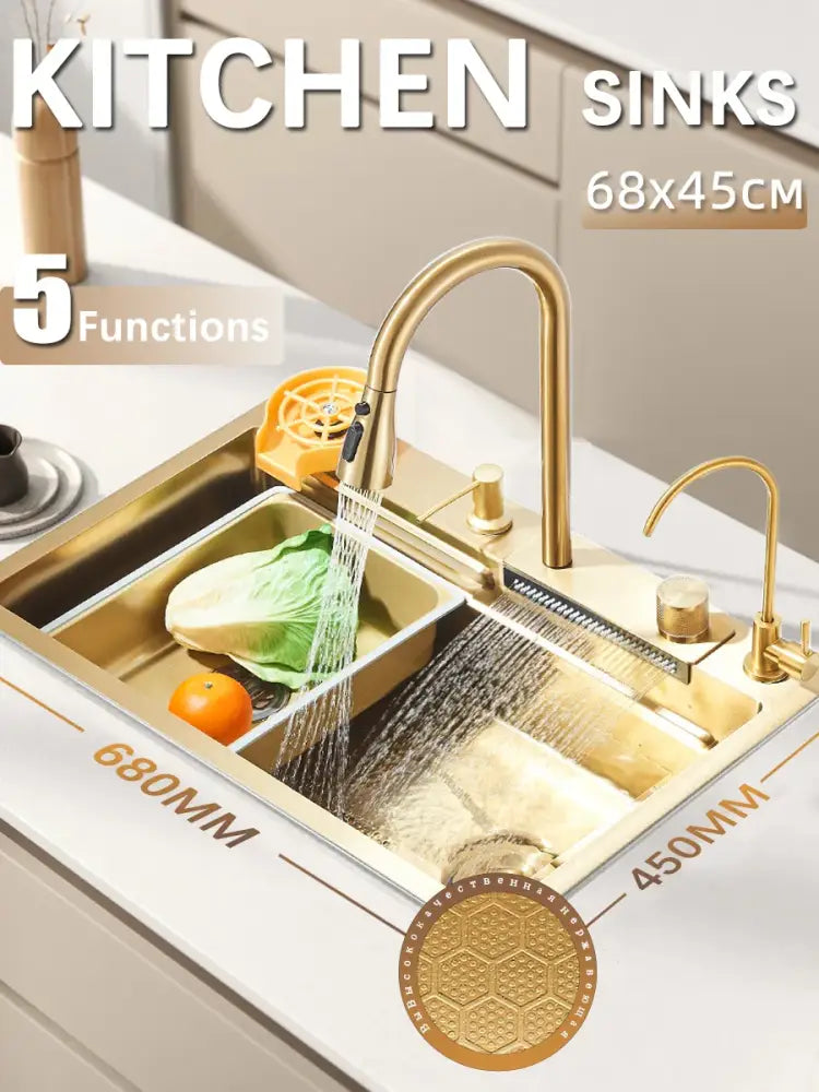 Modern gold stainless steel kitchen sink with two compartments and integrated spray nozzle in a sleek design