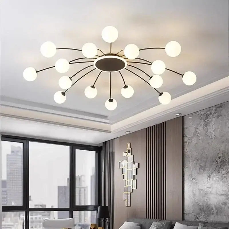 Modern black metal chandelier ceiling light with frosted ball glass globes radiating from a central base