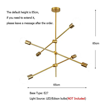Modern gold starburst pendant light with six gold cylindrical arms and glass ball globe for dining room decorbites