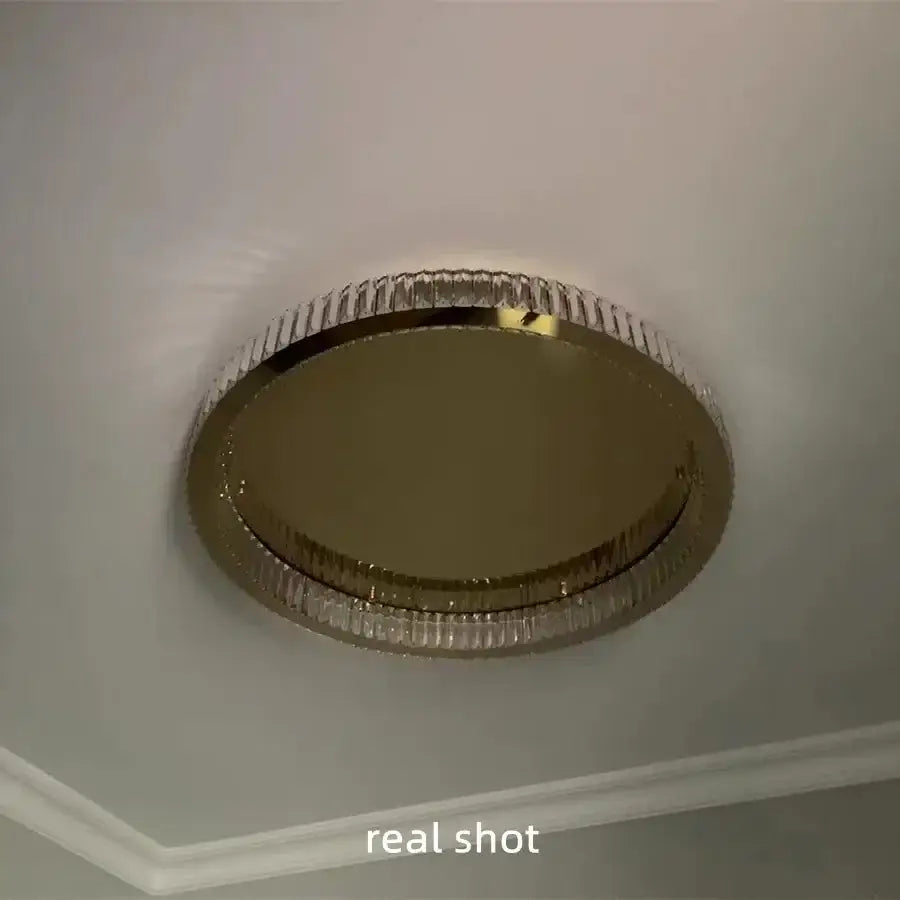 Modern gold steel led dimmable crystal ceiling light with gold-toned metallic frame and clear faceted glass segments for bedroom decorbites gold steel
