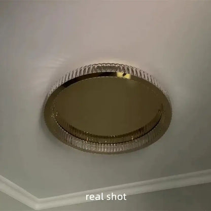 Modern gold steel led dimmable crystal ceiling light with gold-toned metallic frame and clear faceted glass segments for bedroom decorbites gold steel