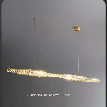 Modern gold steel led pendant light with a golden metallic frame and crystal elements in a wave design for dining decorbites
