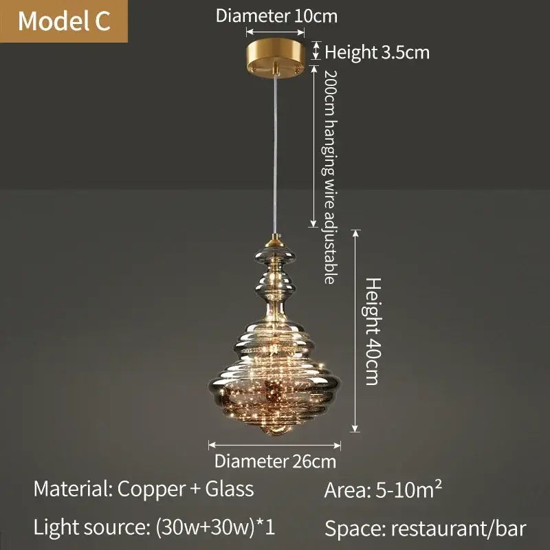 Modern copper and glass pendant light with tiered crystal detailing ideal for elegant modern interiors and dining rooms