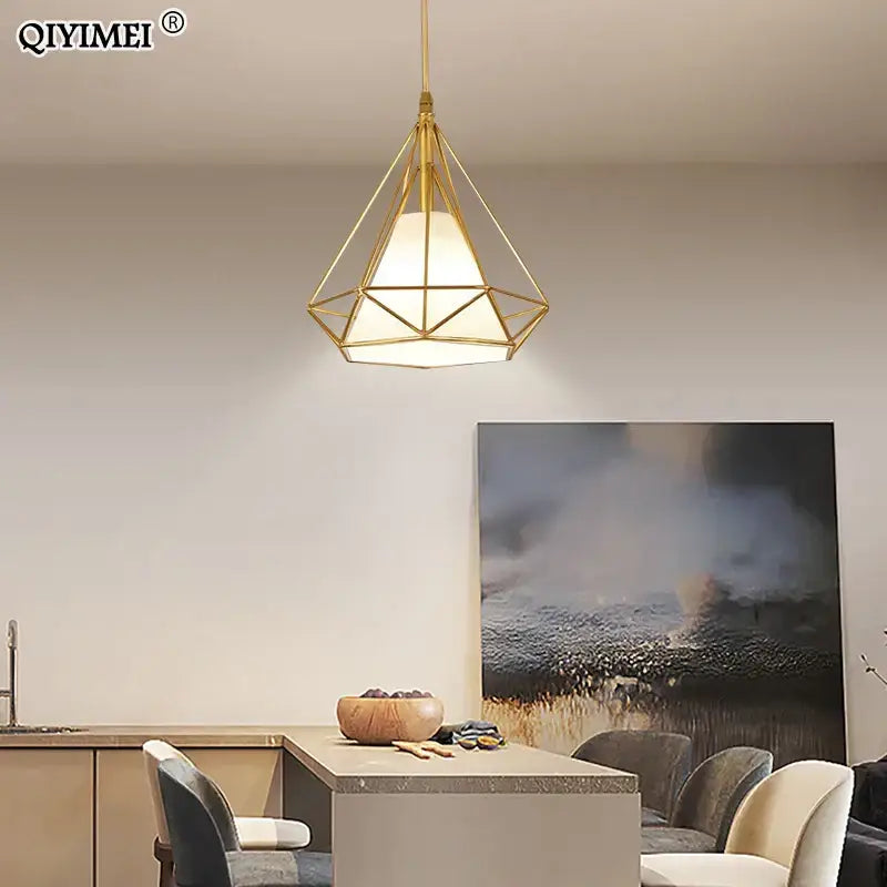 Modern gold triangle pendant lights featuring a geometric gold pendant with frosted glass shade for dining room decorbites gold triangle