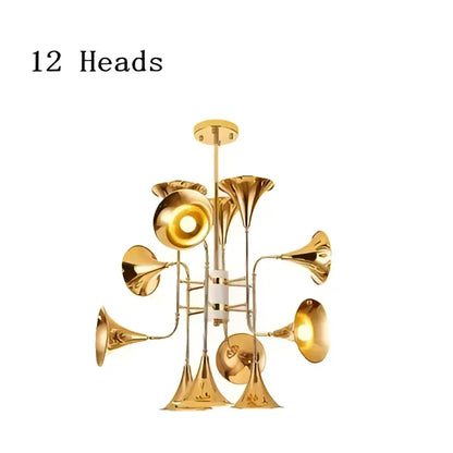 Modern gold trumpet pendant chandelier with twelve trumpet-shaped brass arms for dining room decorbites gold trumpet