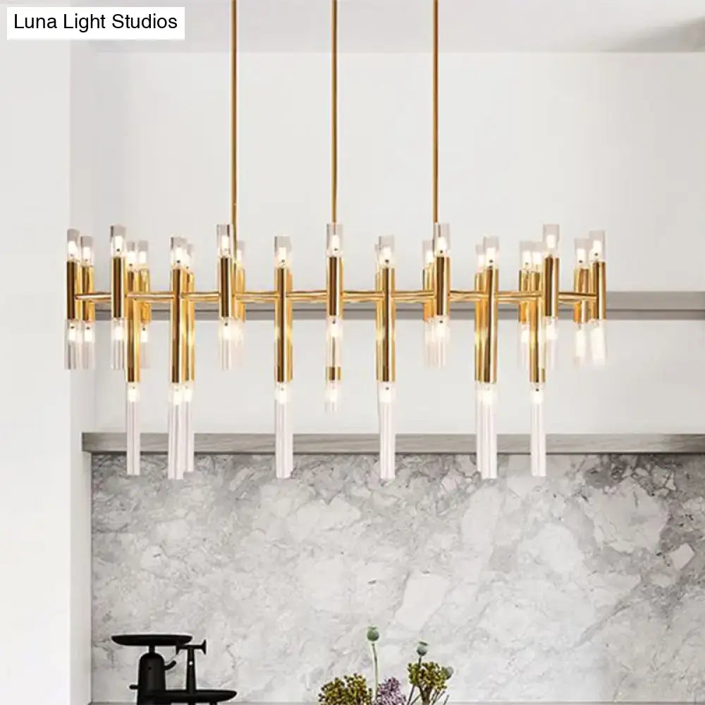 Gold-toned modern DecorBites™ tubular led island pendant with clear acrylic and brass elements for dining room lighting