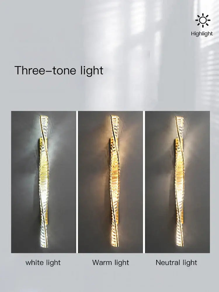 Modern gold twisted crystal wall sconce with metallic finish and led strips offering white warm and neutral tones decorbites crystal wall