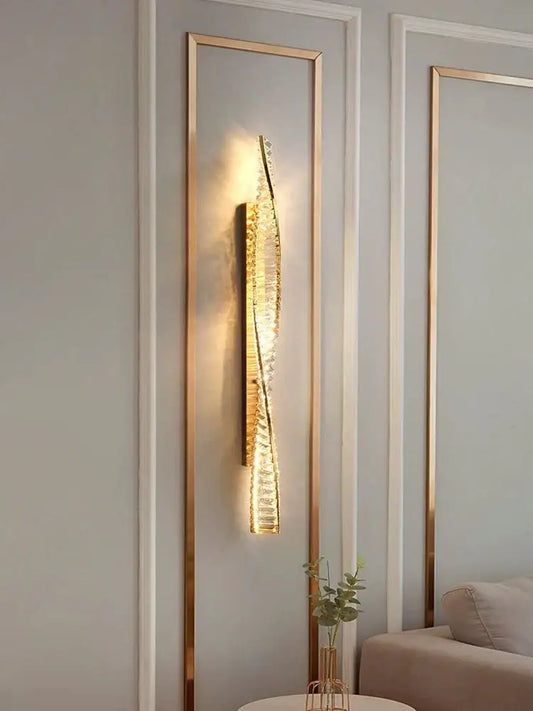 Modern gold twisted crystal wall sconce with sleek design from decorbites crystal wall collection for bedroom light decor