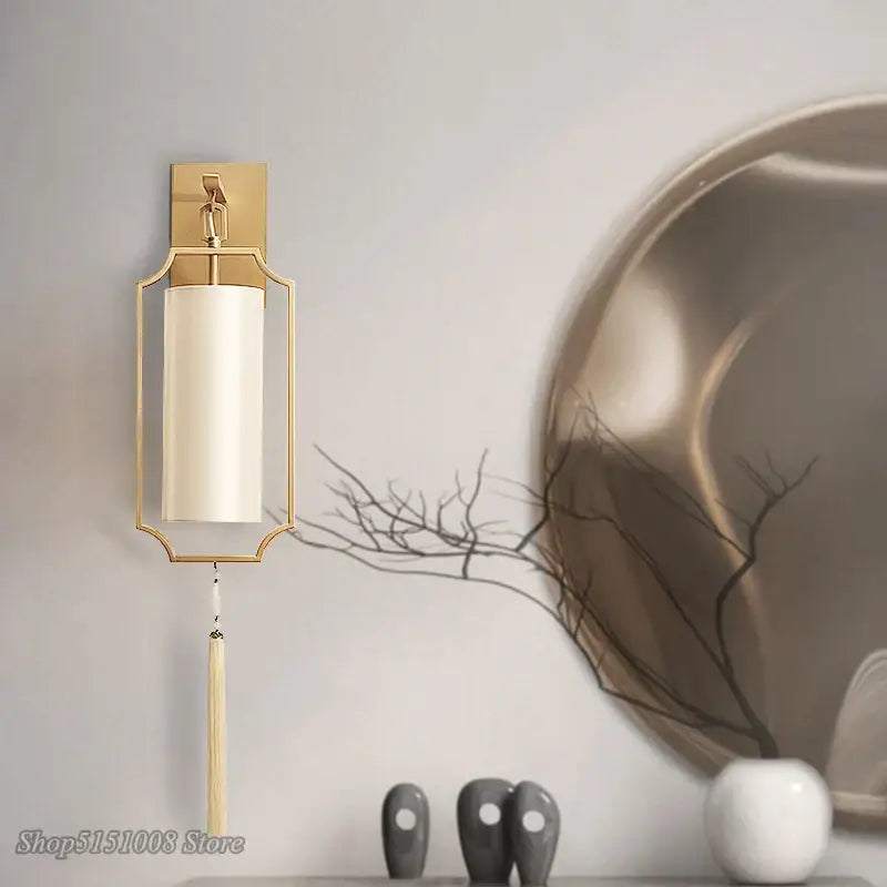Modern gold wall lights with cylindrical off-white tassel shade designed for living room decorbites copper wall lights