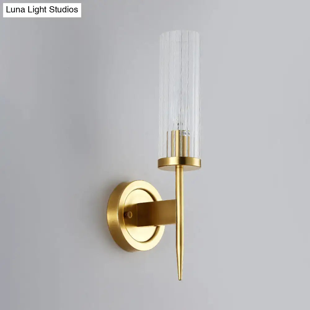 Modern gold wall sconce with clear ribbed glass shade and sleek finish compatible with 110v-120v led incandescent fluorescent