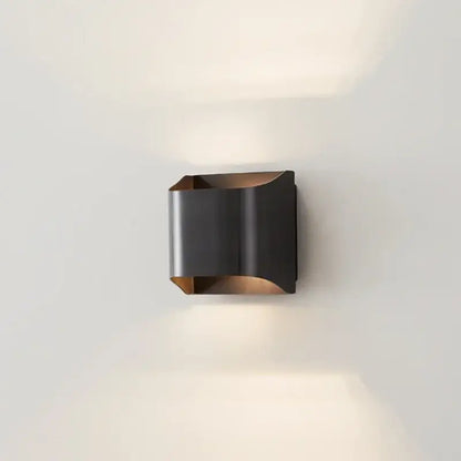 Modern black and bronze wall sconce with sleek angular design minimalist living room wall lamp decorbites copper brass