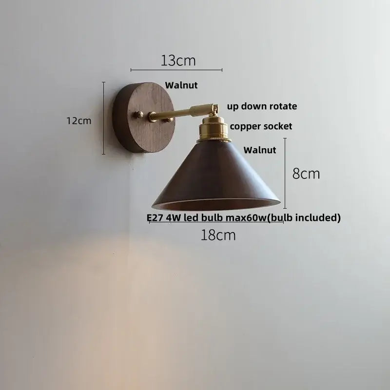 Modern gold walnut wall sconce with pull chain switch featuring dark walnut wood and brass accents for bedroom lighting