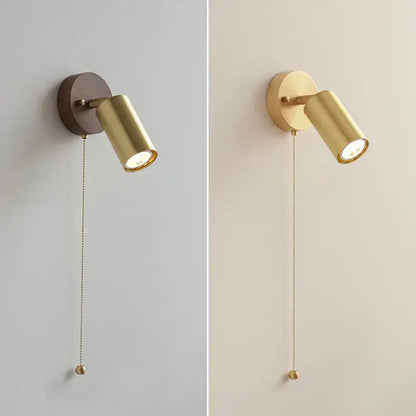 Modern gold walnut wall sconce with pull chain switch and cylindrical gold-finished spotlight for bedroom lighting