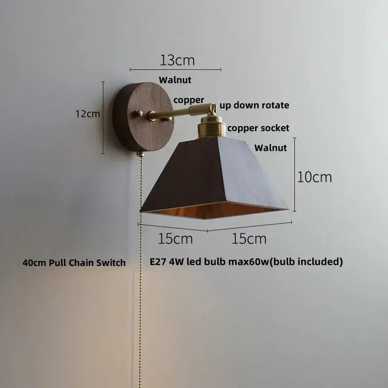 Modern gold walnut wall sconce with pull chain switch featuring a walnut base copper arm and black geometric shade