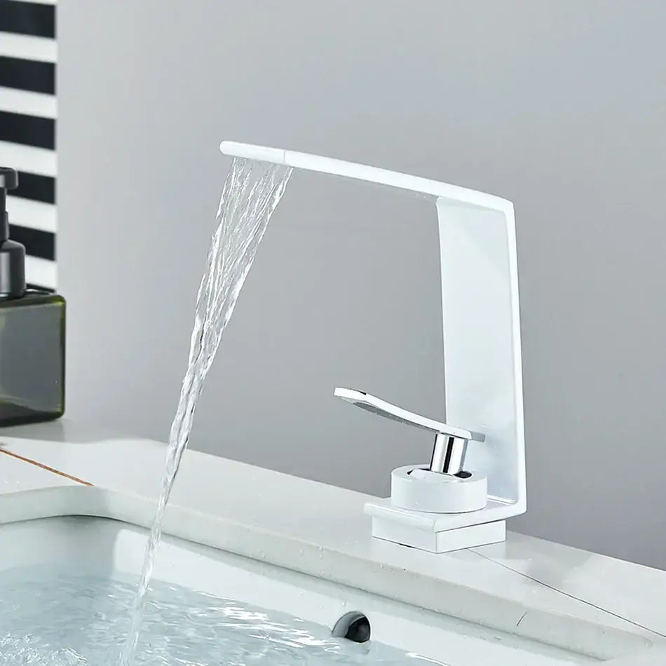 Modern white waterfall basin faucet with chrome accents featuring sleek minimalist design for decorbites basin faucet