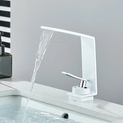 Modern white waterfall basin faucet with chrome accents featuring sleek minimalist design for decorbites basin faucet