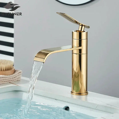 Modern gold waterfall basin faucet with sleek metallic finish and curved spout for decorbites basin faucet use