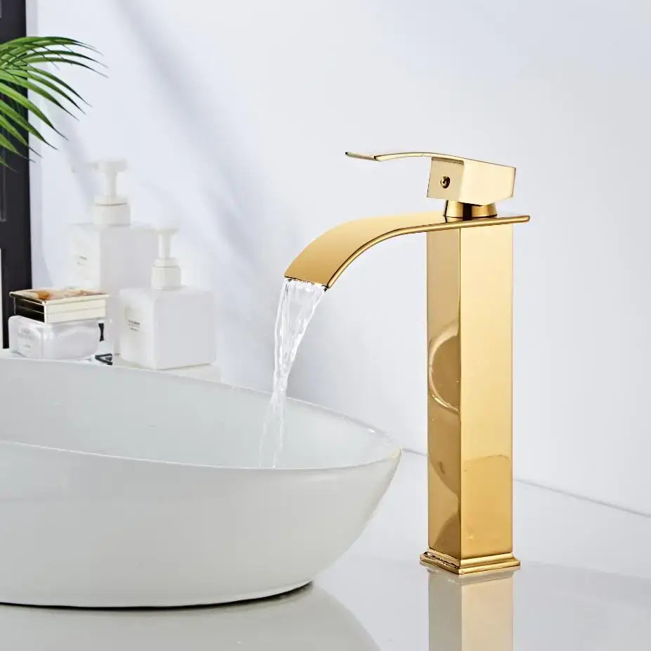 Modern gold waterfall basin faucet with a sleek rectangular design and waterfall spout for bathroom sink decorbites gold waterfall