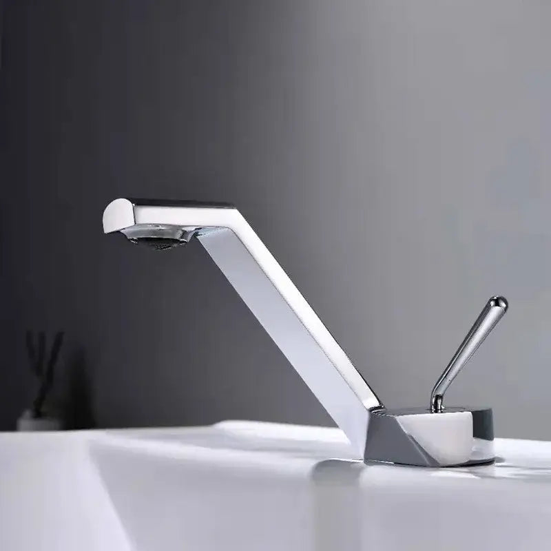 Modern chrome-finished basin faucet with sleek angular design and single lever handle for decorbites black basin use