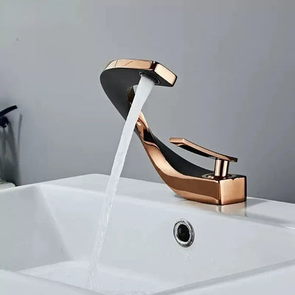 Modern gold waterfall brass basin faucet with rose gold and black finish and sleek curved design for bathroom sink decorbites brass basin faucet