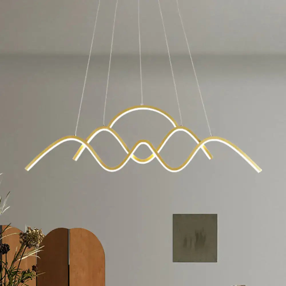 Decorbites modern gold metal led light fixture with sleek wave design for dining room in white warm light