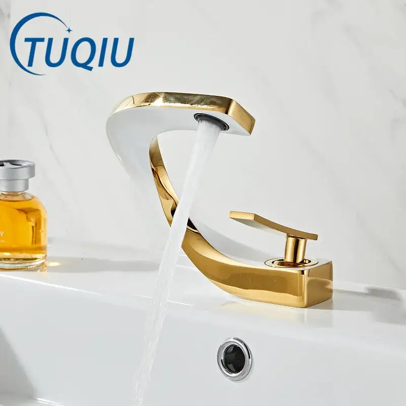 Modern gold white bathroom basin faucet with sleek curved spout in polished gold-toned finish for decorbites gold white decor