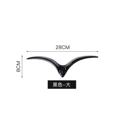 Black glossy bird-shaped ceramic sculpture 28cm long ideal for modern gold and white ceramic pendant wall decor living room