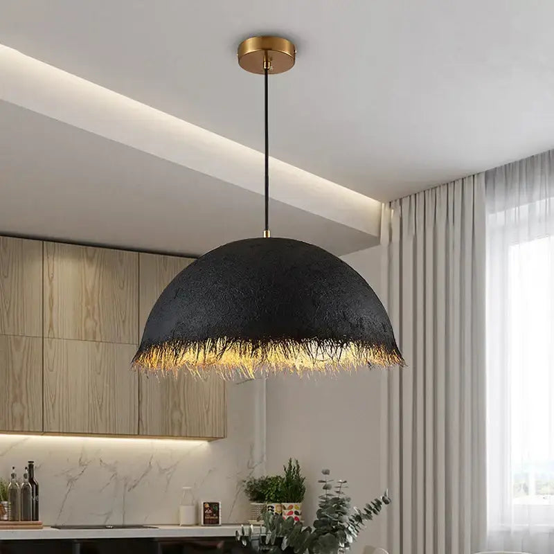 Black dome-shaped pendant lamp with woven fiber texture and gold brass hardware for modern decorbites gold white style