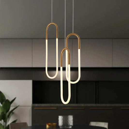 Modern gold and white pendant lights with sleek curved designs hanging from ceiling ideal for living room decorbites gold pendant