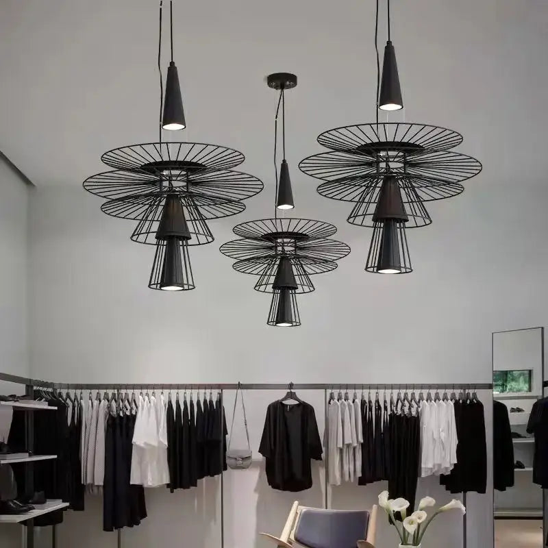 Modern black metal chandelier with radial wireframe design and conical lamp shades gravity suspension lamp for dining room