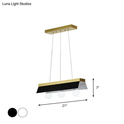 Modern rectangular pendant light with gold metal frame, black white shade, and three spherical led bulbs for restaurant use