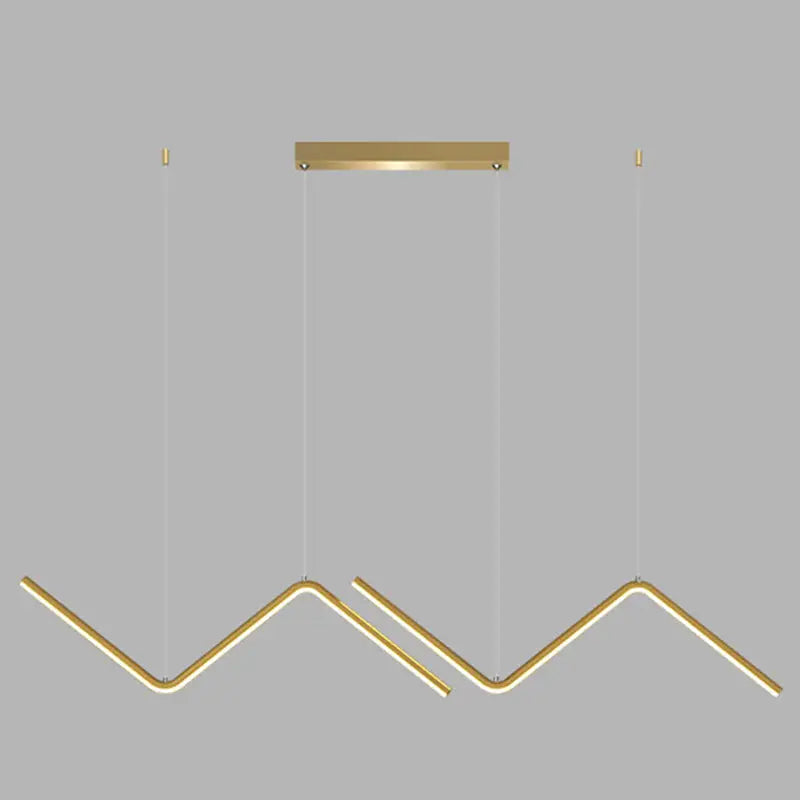 Modern gold-toned zigzag pendant lighting fixture with sleek angular design and minimalist suspension for dining room