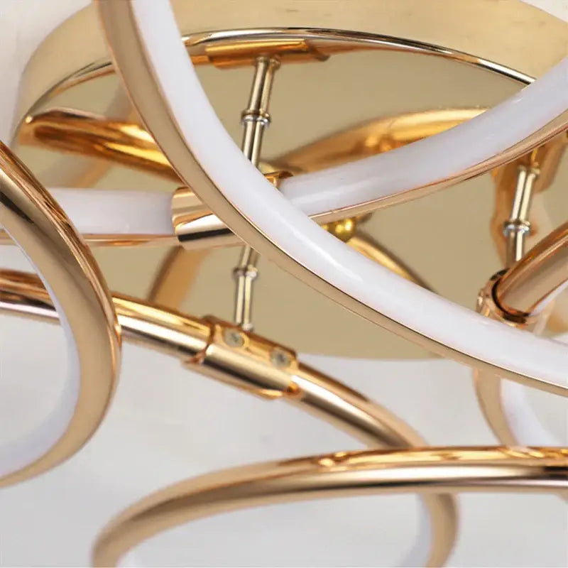 Modern decorbites golden aluminum ceiling lights with gold-toned circular rings and white frosted glass tubes