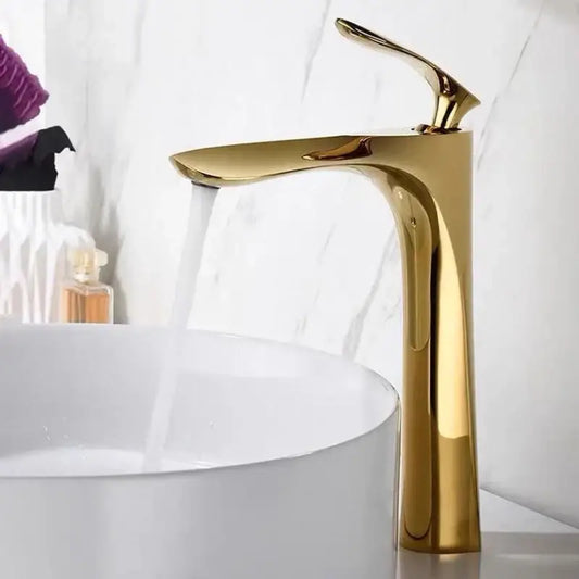 Modern golden bathroom faucet with sleek curved single handle and polished metallic finish for decorbites golden bathroom decor
