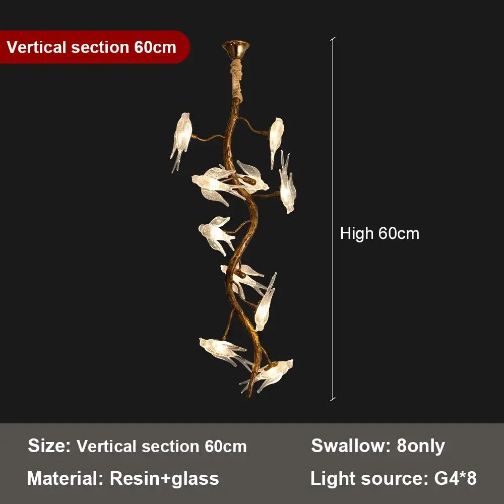 Modern golden bird crystal glass branch chandelier with eight white swallow-shaped lights in brass-colored resin decorbites bird crystal
