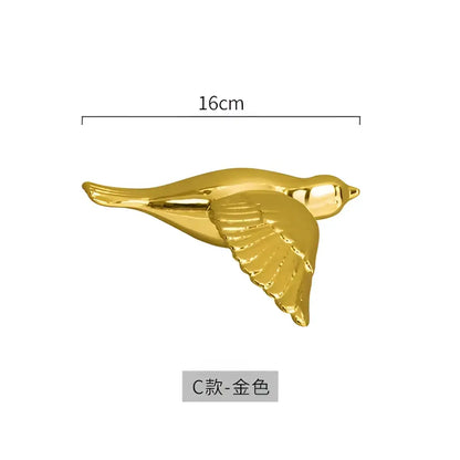 Modern golden bird wall hanging 16cm long metal pin for elegant living room decor and bird wall hanging display