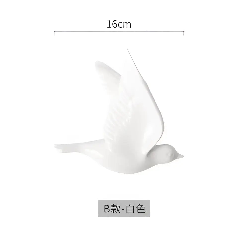 White ceramic bird figurine 16cm length as part of modern golden bird wall hanging for living room decor
