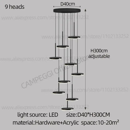 Modern golden black led long chandelier with nine circular black led heads suspended at varying heights for dining room staircases