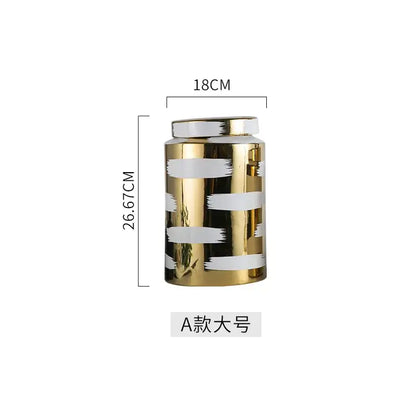 A sleek golden ceramic jar with white brushstroke stripes from the decorbites golden ceramic living room set