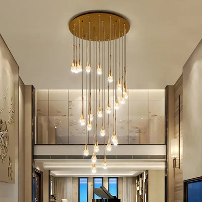 Modern golden crystal led staircase chandelier with teardrop-shaped pendants for lobby decorbites crystal led lighting