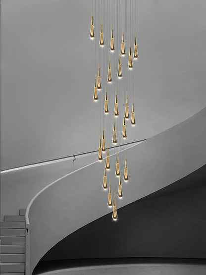 Modern golden crystal pendant chandelier with cascading teardrop lights by decorbites crystal pendant for living room decor